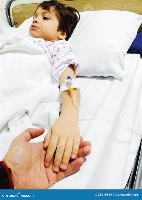 Sick child on hospital bed stock image. Image of recovery - 38219549