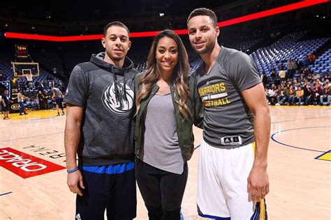 Sydel Curry poses with her brothers Seth Curry of the Dallas Mavericks and Stephen Curry of the ...