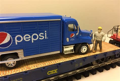 The new flatcar with Pepsi Cola delivery truck load from Menards - Classic Toy Trains Magazine