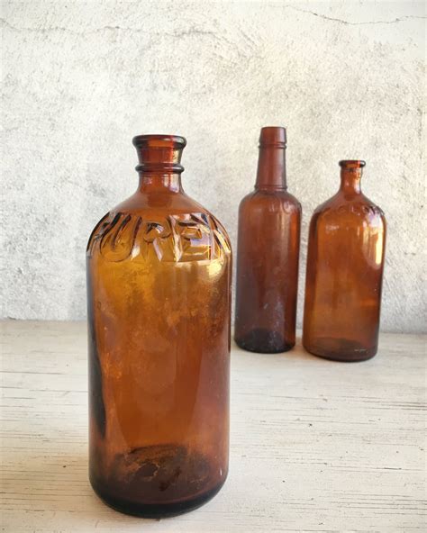 Lot of three vintage amber glass bottles, vintage apothecary bottles, Clorox bottle, Purex ...