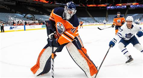 Oilers goalie Mike Smith as unique a presence as he is a talent