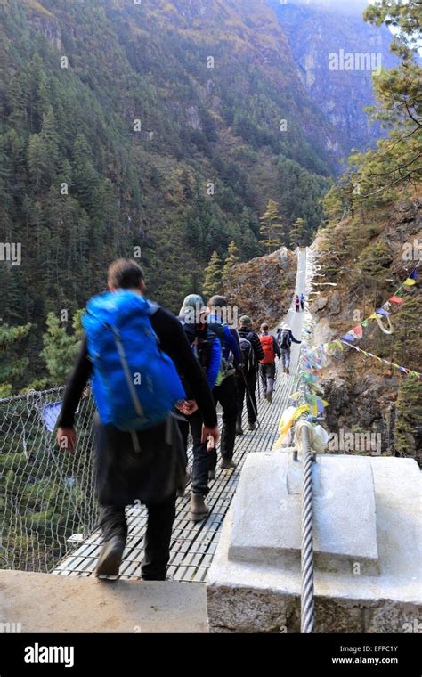 The Larja suspension Bridge over the Dudh Koshi river, near Namche Bazar village, Everest base ...