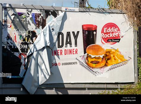 Eddie Rocket's torn billboard advertisement poster burger and chips ...