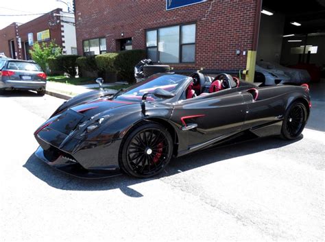 Pagani Huayra Roadster in fully exposed Black carbon fiber w/ Red accents Photo taken by ...