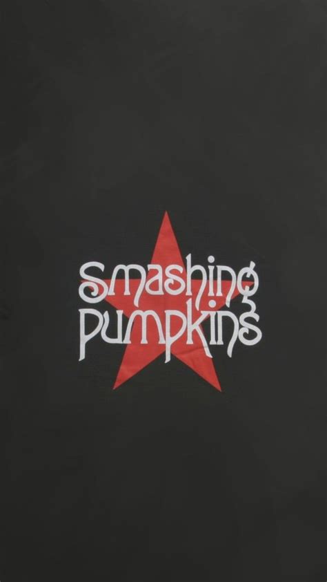 the smashing pumpkins logo is shown on a black background with red and white stars