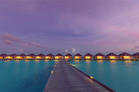 Maldives Island Sunset. Water Bungalows Photograph by Levente Bodo ...