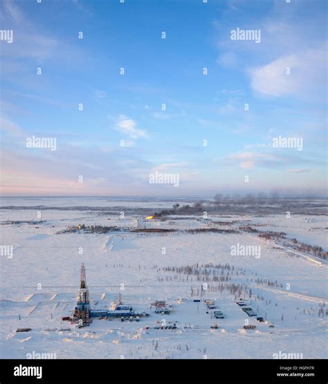 Aerial view of oil rig at an oil field in Western Siberia in the winter ...