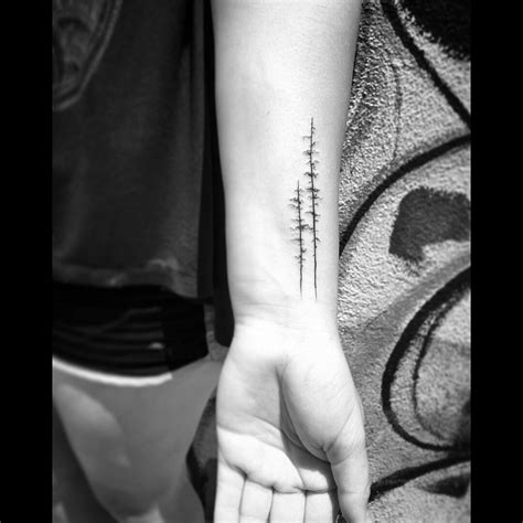 Long skinny tattoo ideas photos