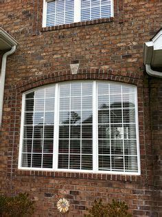 Brick double rowlock OR soldier around front windows (entry) @ exercise and garage window. key ...