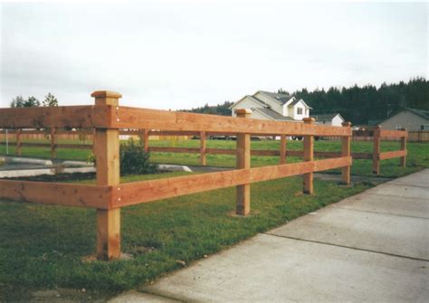 4x4 and 2x6 2 Rail cedar wooden fence. | Wooden fence, Backyard fences, Fence design