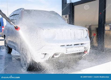 Car in the Foam at the Car Wash. Manual Car Wash Stock Photo - Image of ...