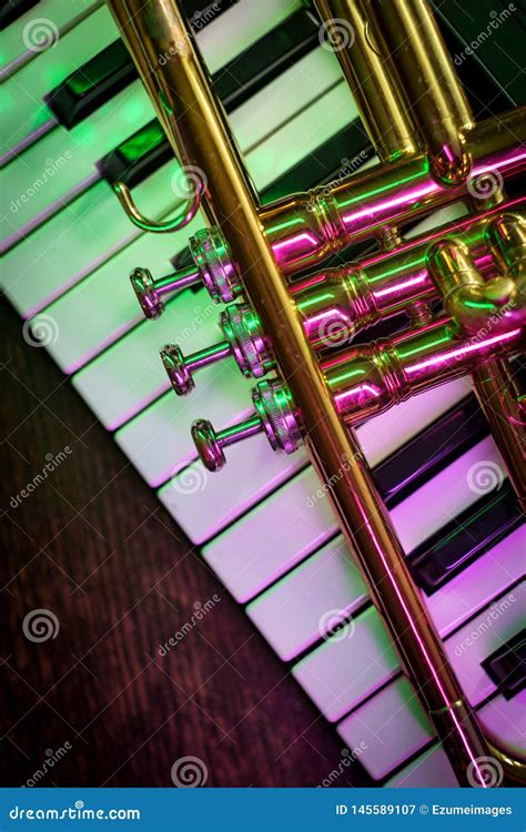 Old Trumpet Piano Keyboard stock image. Image of trumpet - 145589107