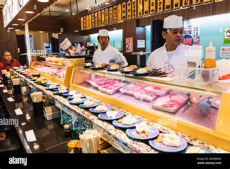 Sushi train tokyo hi-res stock photography and images - Alamy