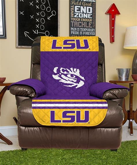 a purple and yellow lsu recliner in a living room
