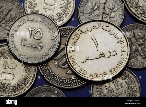 Coins of the United Arab Emirates. UAE one dirham and twenty five Stock ...