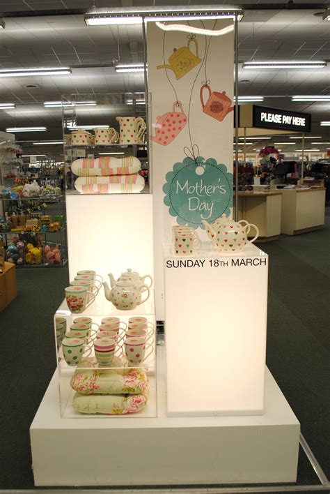 // display // visual merchandising // mothers day display // 2012 // mugs and cushions // cat ...