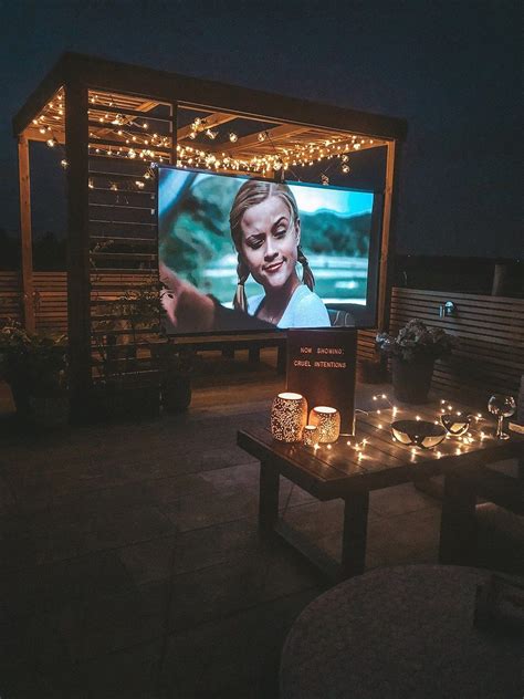 How To Create Your Own Outdoor Cinema | Backyard movie nights, Outdoor cinema, Backyard