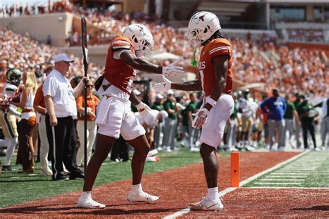 Texas' Isaiah Bond did the iconic James Bond pose after scoring his ...