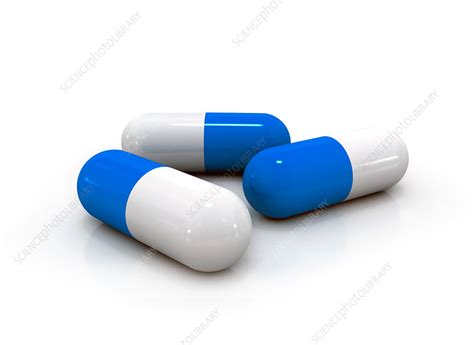 Blue and white capsules - Stock Image - F017/6051 - Science Photo Library