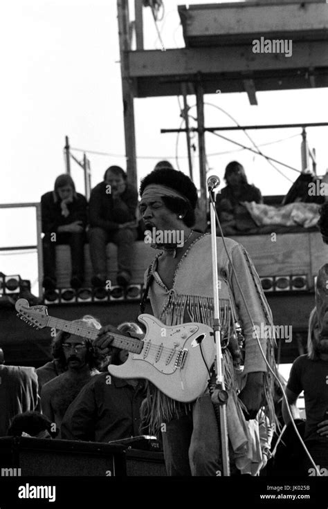 Jimi Hendrix performing his legendary 2 hour performance at Woodstock ...