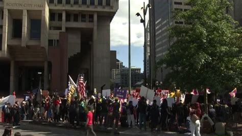 Demonstrators protest raising of Chinese flag at Boston City Hall ...