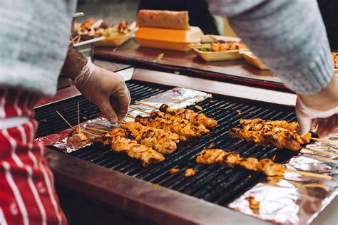 grilling chicken skewers, Grilling, chicken, skewers, cooking, hands, meat, food | Piqsels
