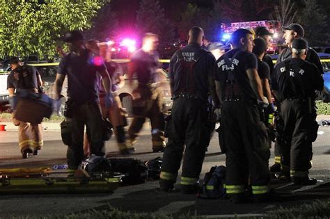 PHOTOS: Gunman Open Fires at a Midnight Showing of The Dark Knight ...