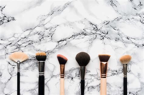 Makeup Brushes on White Marble Background Free Stock Photo | picjumbo