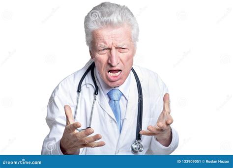 Portrait of Angry Senior Male Doctor Posing Against White Background Stock Image - Image of ...