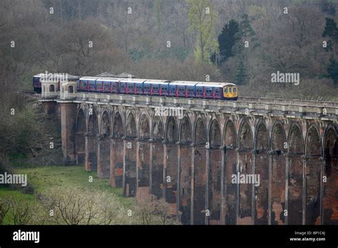 A train crosses the Ouse Valley viaduct near Balcombe Stock Photo - Alamy