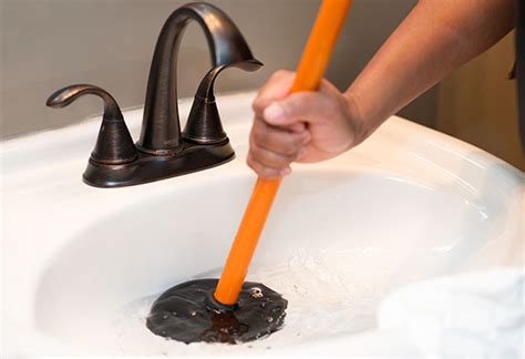 How To Clear Clogged Sink Drains with a Plunger at The Home Depot