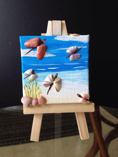 I painted this and used Coquina sea shells as dragonfly on a mini ...