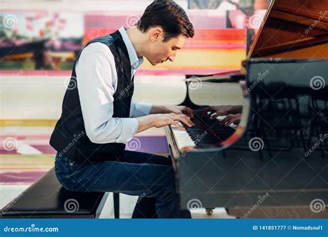 Male Pianist Practicing Composition on Grand Piano Stock Image - Image ...