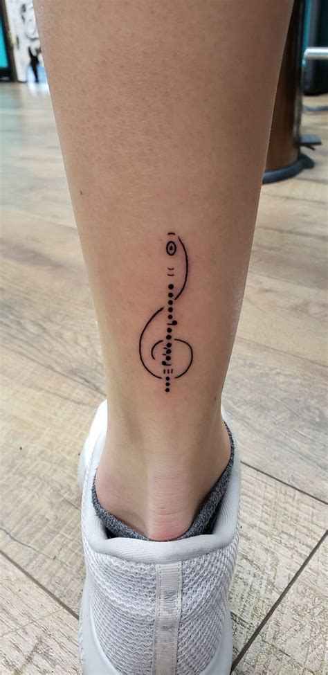 Flautist's Tattoo | Flute tattoo, Music tattoo designs, Small music tattoos