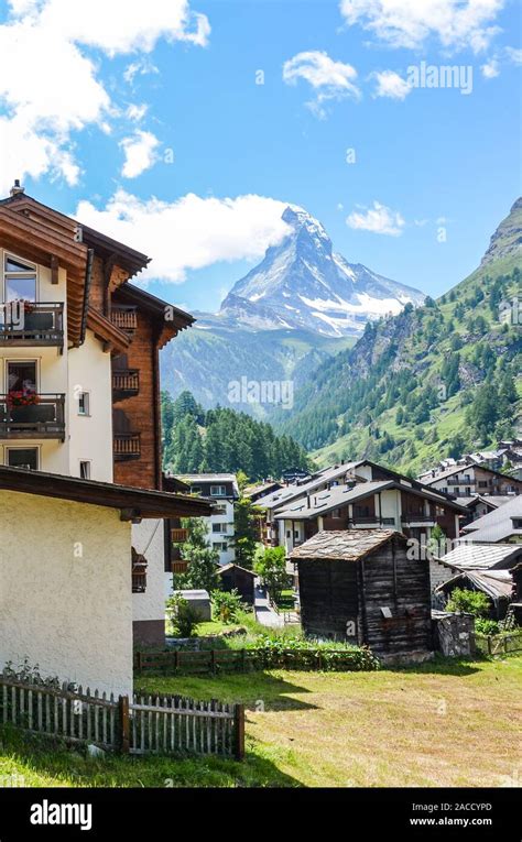 Picturesque Alpine village Zermatt in Switzerland in the summer season. Famous Matterhorn ...