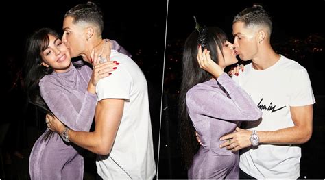 Cristiano Ronaldo Plants a Sweet Kiss on Girlfriend Georgina Rodriguez ...