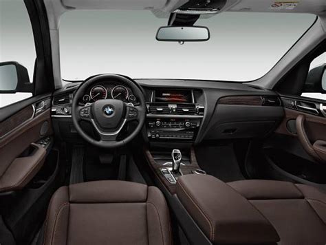 The new BMW X3 - Interior, Nevada leather Mocha - Interior trim, Fineline Anthracite wood with ...