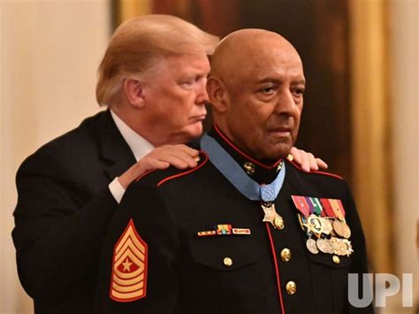 Photo: President Trump awards Medal of Honor to retired Sgt. Maj. John ...