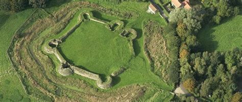 Sunny aerial view showing stone remains of the 13th century hexagonal Bolingbroke Castle ...