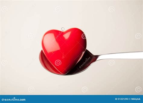 Red heart shape in spoon stock image. Image of abstract - 51221293