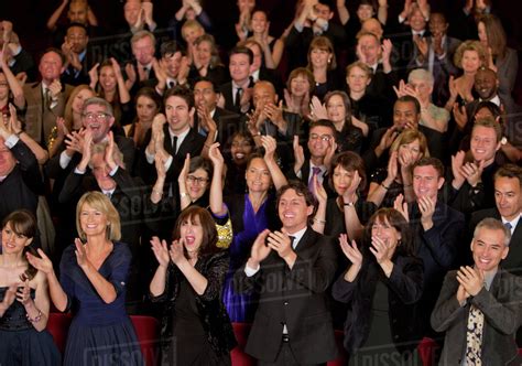 Clapping theater audience - Stock Photo - Dissolve