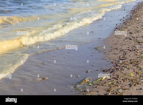 spill disaster on sea yellow pollution Stock Photo - Alamy