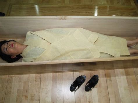 South Korea: Death Schools Force Suicidal People into Coffins