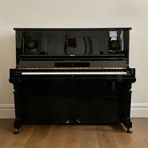 A Steinway Model K Upright Piano