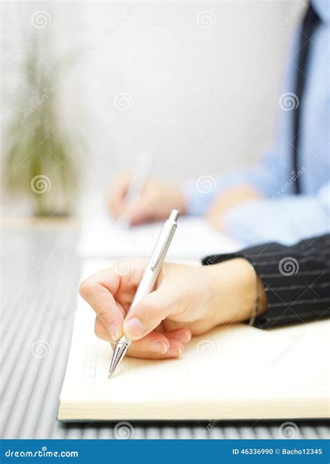 Business People Writing Notes Sitting In The Office Stock Photo - Image: 46336990