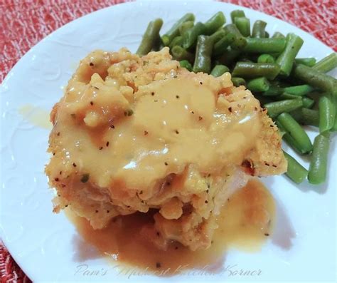 Stuffing-topped Baked Pork Chops w/Gravy | Pork chops and gravy, Baked pork chops, Easy baked ...