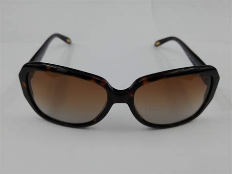 PAIR OF RALPH LAUREN RA5138 POLARIZED SUNGLASSES WITH CASE