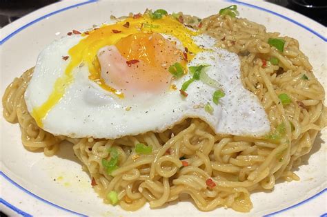 Indomie with a fried egg on top is a god-tier midnight snack : r/PutAnEggOnIt