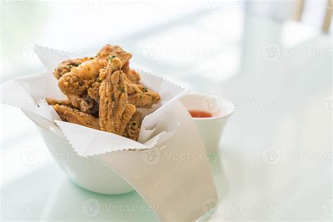 Fried chicken wings with sauce 3106067 Stock Photo at Vecteezy