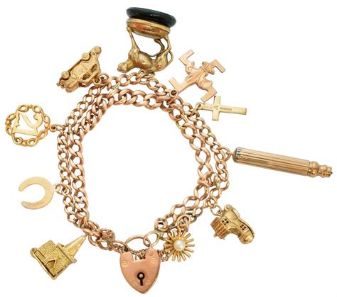 Lot 25 - A 9ct gold charm bracelet,